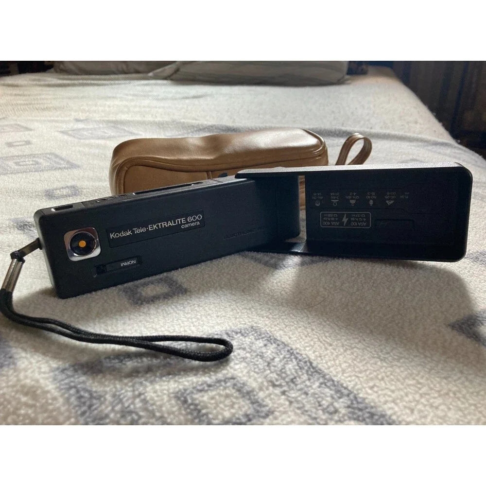 Kodak 600 camera with vintage leather camera case